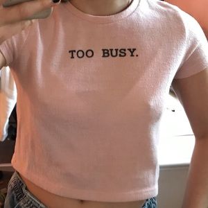 Pink fuzzy baby tee “Too Busy.”